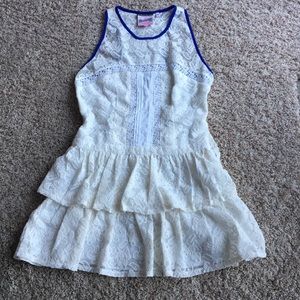 A blue laced white, floral mini dress